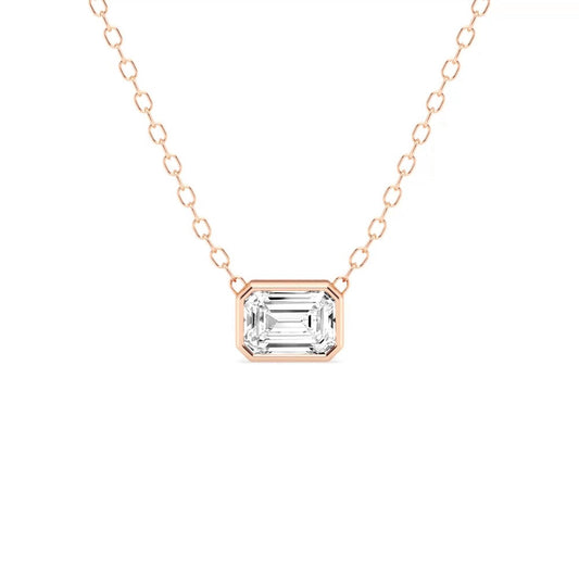 Front view of Puro Emerald Solitaire Diamond Pendant with rose gold chain.